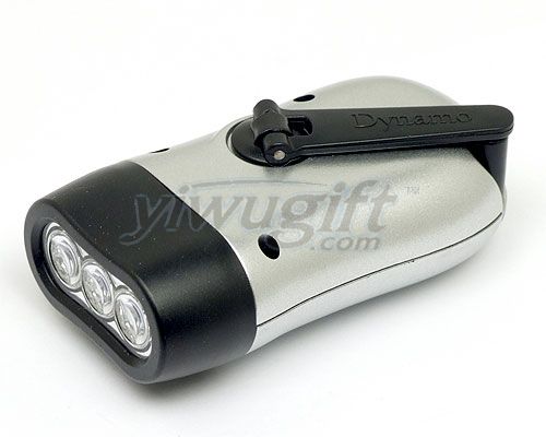 Hand operated flashlight